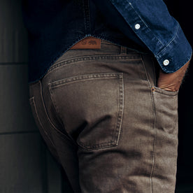fit model showing the back of The Democratic All Day Pant in Washed Walnut Selvage