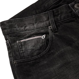 material shot of selvage 5th pocket on The Democratic Jean in Black 3-Month Wash Selvage