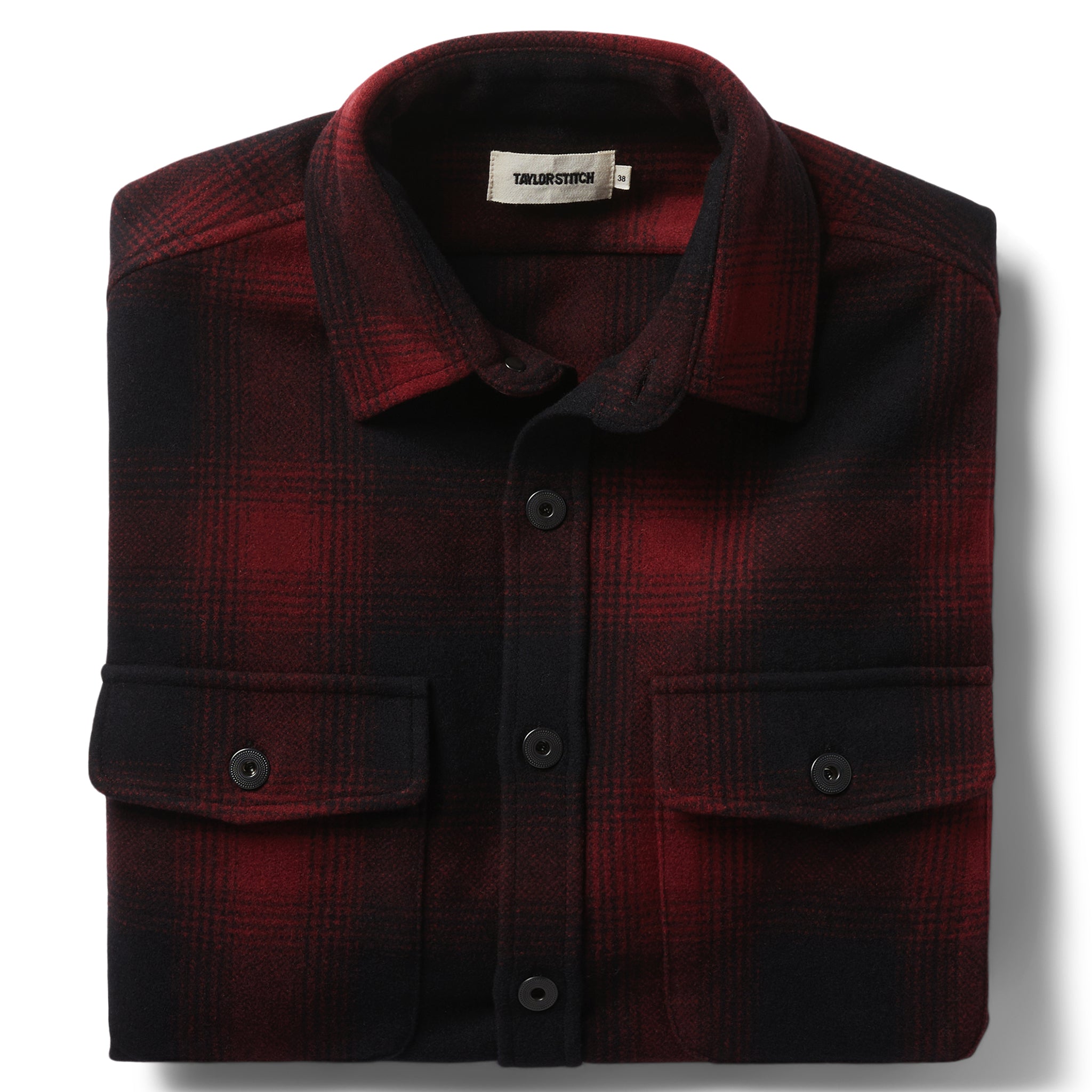 flatlay of The Explorer Shirt in Cardinal Plaid folded, Wovens by Taylor Stitch