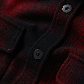 material shot of the buttons on The Explorer Shirt in Cardinal Plaid