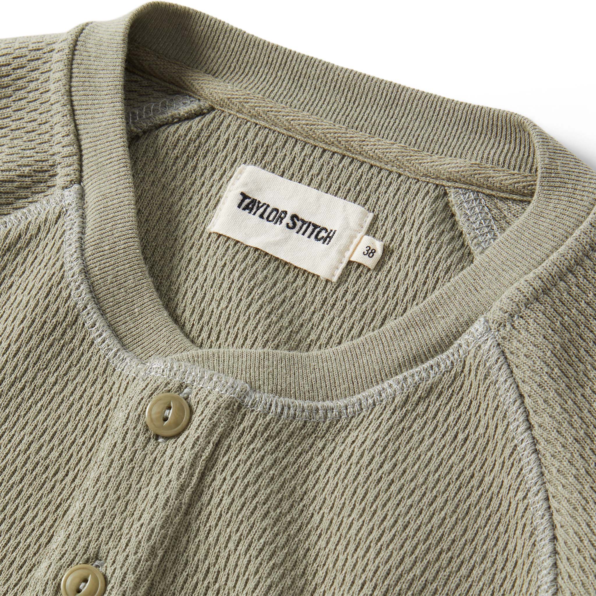 material shot of the collar on The Heavy Bag Waffle Henley in Army, Knits by Taylor Stitch
