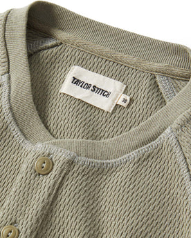 material shot of the collar on The Heavy Bag Waffle Henley in Army, Knits by Taylor Stitch