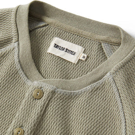 material shot of the collar on The Heavy Bag Waffle Henley in Army
