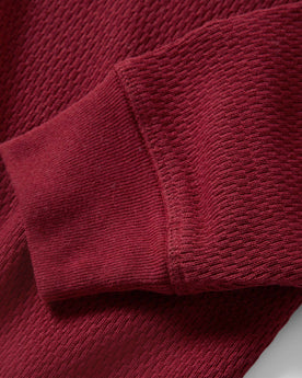 material shot of the sleeves on The Heavy Bag Waffle Henley in Burgundy, Knits by Taylor Stitch