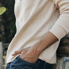 fit model with his hand in his pocket of The Heavy Bag Waffle Henley in Oatmeal