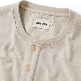material shot of the collar on The Heavy Bag Henley in Oatmeal