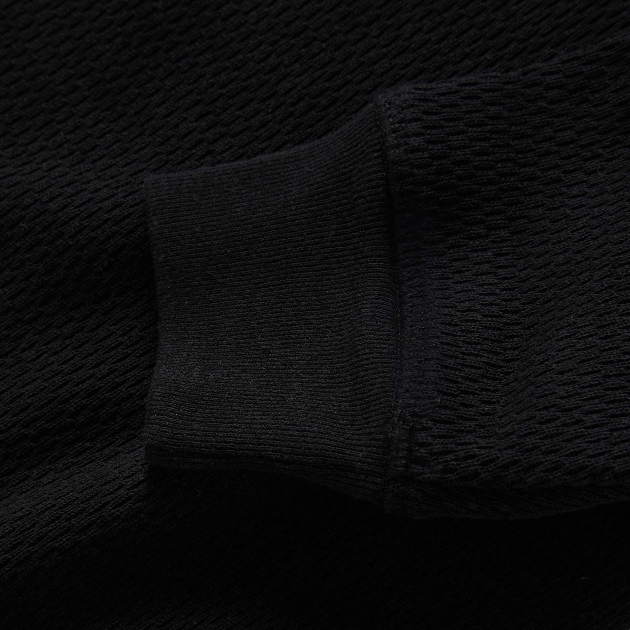 material shot of the cuffs on The Heavy Bag Waffle Long Sleeve in Coal, Knits by Taylor Stitch