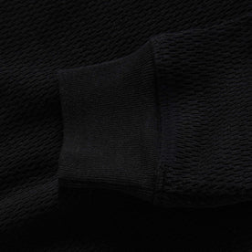 material shot of the cuffs on The Heavy Bag Waffle Long Sleeve in Coal
