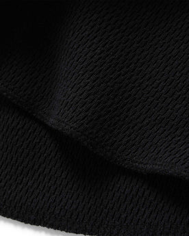 material shot of the hem on The Heavy Bag Waffle Long Sleeve in Coal, Knits by Taylor Stitch
