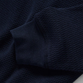 material shot of the cuffs on The Heavy Bag Waffle Long Sleeve in Navy