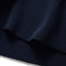 material shot of the hem on The Heavy Bag Waffle Long Sleeve in Navy