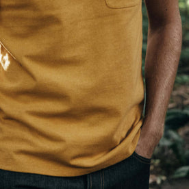 fit model showing bottom of The Heavy Bag Tee in Honey