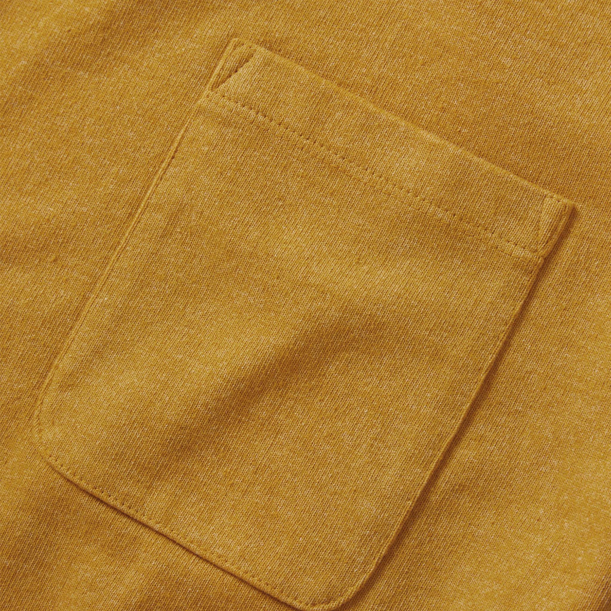 material shot of the pocket on The Heavy Bag Tee in Honey, Knits by Taylor Stitch
