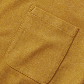 material shot of the pocket on The Heavy Bag Tee in Honey