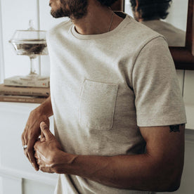 fit model showing off The Heavy Bag Tee in Oatmeal