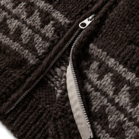 material shot of the bottom zipper on The Seawall Hand-Knit Sweater in Mahogany