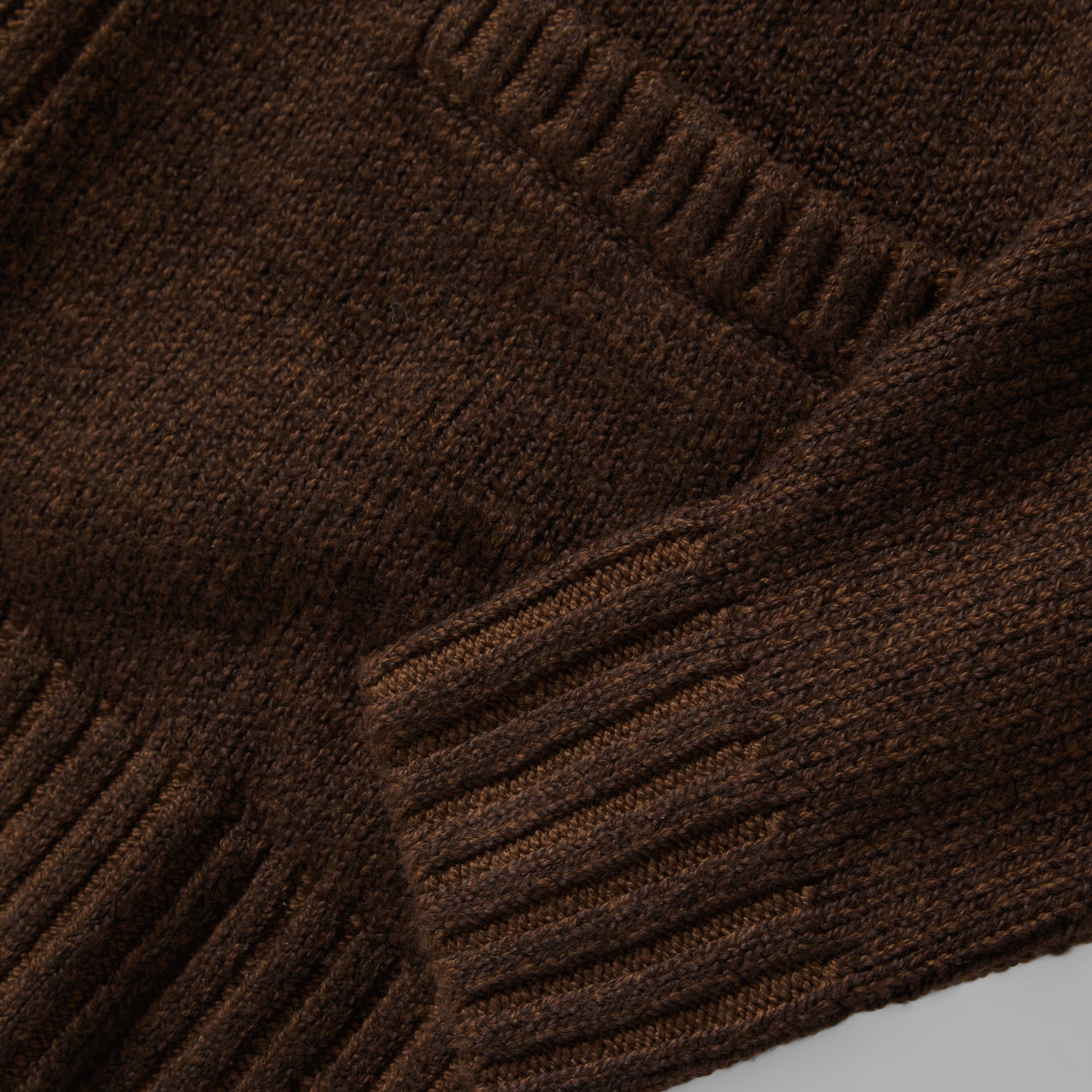 material shot of the cuffs on The Headland Shawl Cardigan in Marled Chocolate, Knits by Taylor Stitch