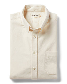 flatlay of The Jack in Sand Oxford folded, Wovens by Taylor Stitch