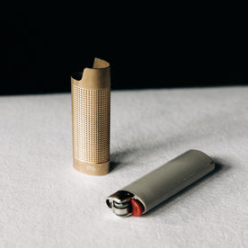 editorial image of the sleeve out of the lighter for The Lighter Sleeve in Brass