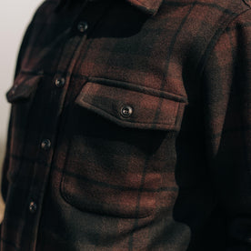 fit model posing in The Maritime Shirt Jacket in Carson Plaid