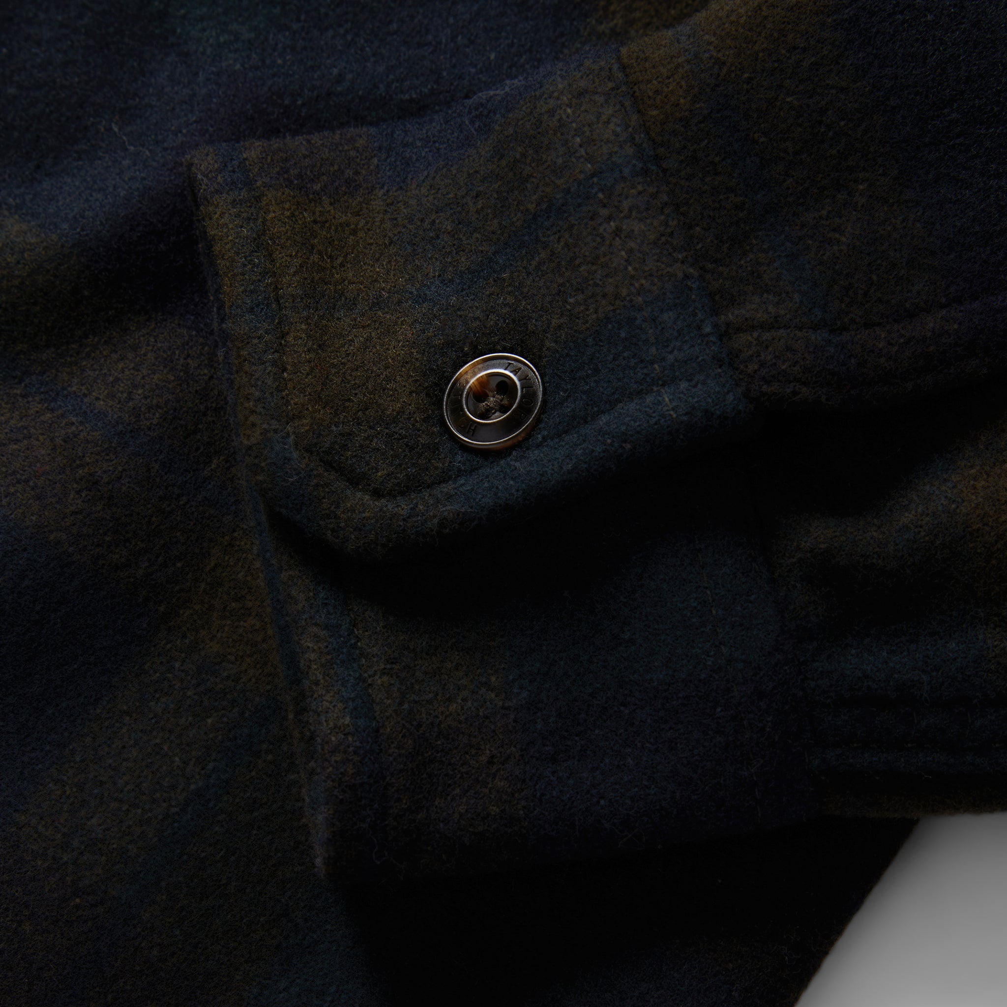 material shot of the cuff on The Maritime Shirt Jacket in Pike Plaid, Wovens by Taylor Stitch