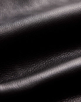 material shot of the pocket of The Moto Jacket in Black Steerhide, Outerwear by Taylor Stitch