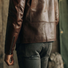 fit model showing the back of The Moto Jacket in Espresso Steerhide