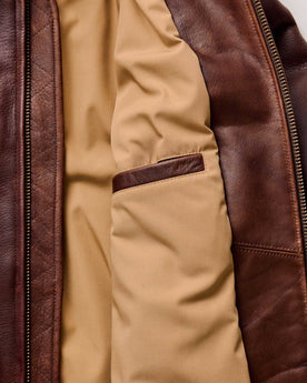 material shot of the inner pocket on The Moto Jacket in Espresso Steerhide, Outerwear by Taylor Stitch