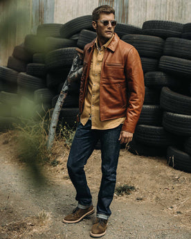 fit model showing the back of The Moto Jacket in Whiskey Steerhide, Outerwear by Taylor Stitch