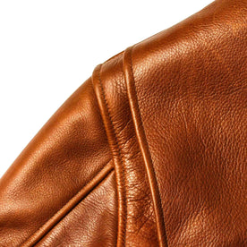 material shot of the shoulder detail on The Moto Jacket in Whiskey Steerhide