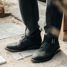 fit model showing off side detail on The Moto Boot in Black Weatherproof Nubuck