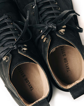 material shot of the tops of The Moto Boot in Black Weatherproof Nubuck, Footwear by Taylor Stitch