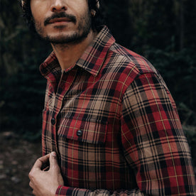 fit model showing off pocket detail on The Moto Utility Shirt in Cardinal Plaid