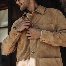 fit model buttoning up The Ojai Jacket in Cognac Suede