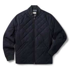 flatlay of The Quilted Bomber Jacket in Navy Dry Wax