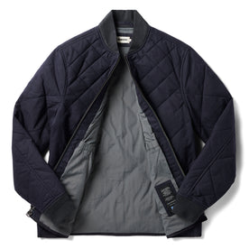 flatlay of The Quilted Bomber Jacket in Navy Dry Wax open