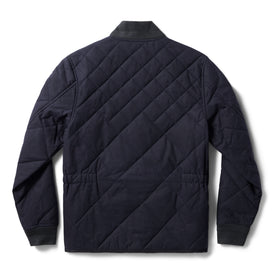 flatlay of the back of The Quilted Bomber Jacket in Navy Dry Wax