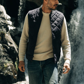 fit model posing in The Quilted Bomber Vest in Navy Dry Wax