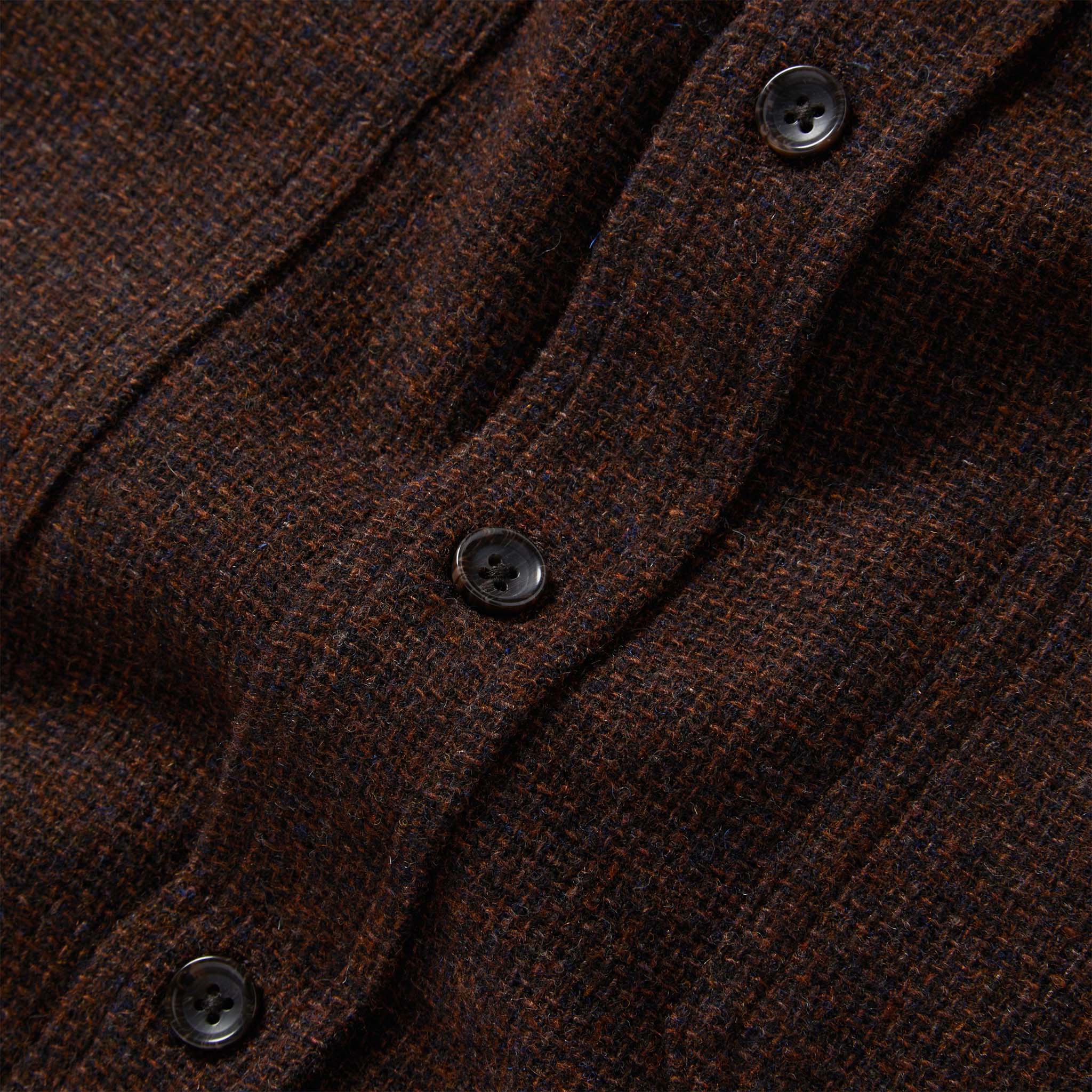 material shot of the buttons on The Service Shirt in Ginger Melange Wool, Wovens by Taylor Stitch