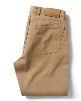 flatlay of the back of The Slim All Day Pant in Washed Tobacco Selvage folded, Bottoms by Taylor Stitch