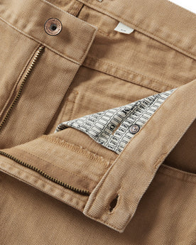 material shot of the fly on The Slim All Day Pant in Washed Tobacco Selvage, Bottoms by Taylor Stitch