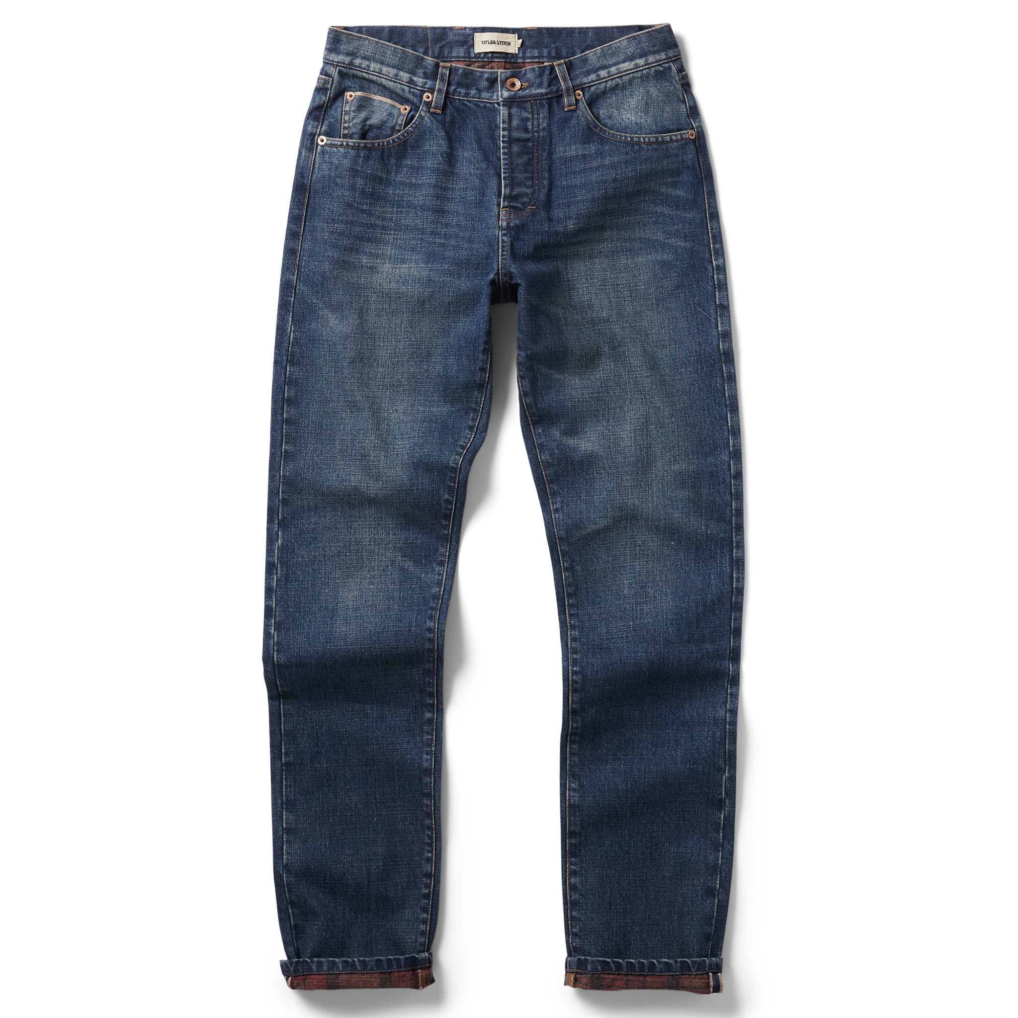 flatlay of The Slim Brushed Back Jean in Sawyer Wash Organic Selvage, Bottoms by Taylor Stitch