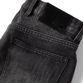 material shot of the leather logo patch on The Slim Jean in Black 3-Month Wash Selvage