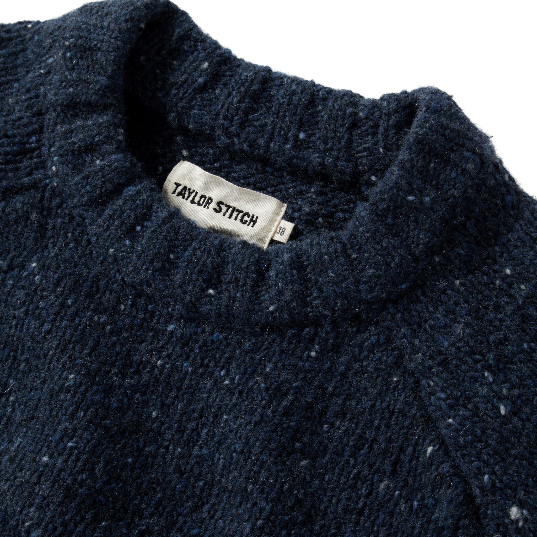 material shot of the collar on The Topside Sweater in Navy Donegal, Knits by Taylor Stitch