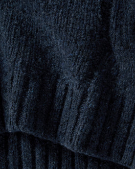material shot of the hem on The Topside Sweater in Navy Donegal, Knits by Taylor Stitch