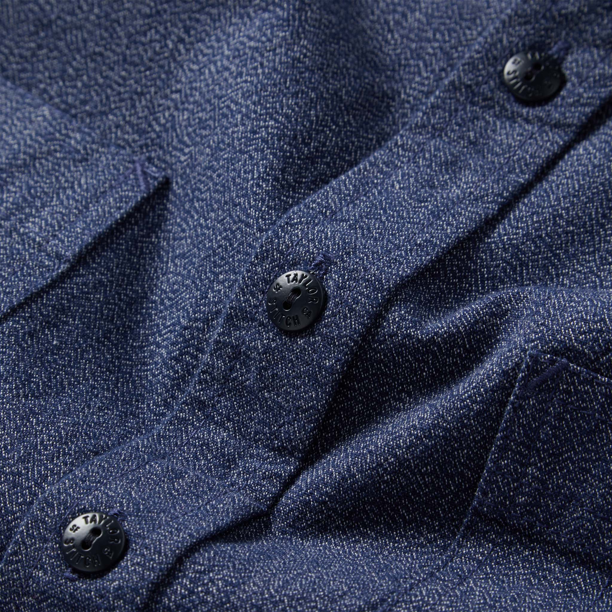 material shot of the buttons on The Utility Shirt in Navy Jaspe, Wovens by Taylor Stitch