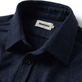 material shot of the collar on The Utility Shirt in Navy Donegal Wool