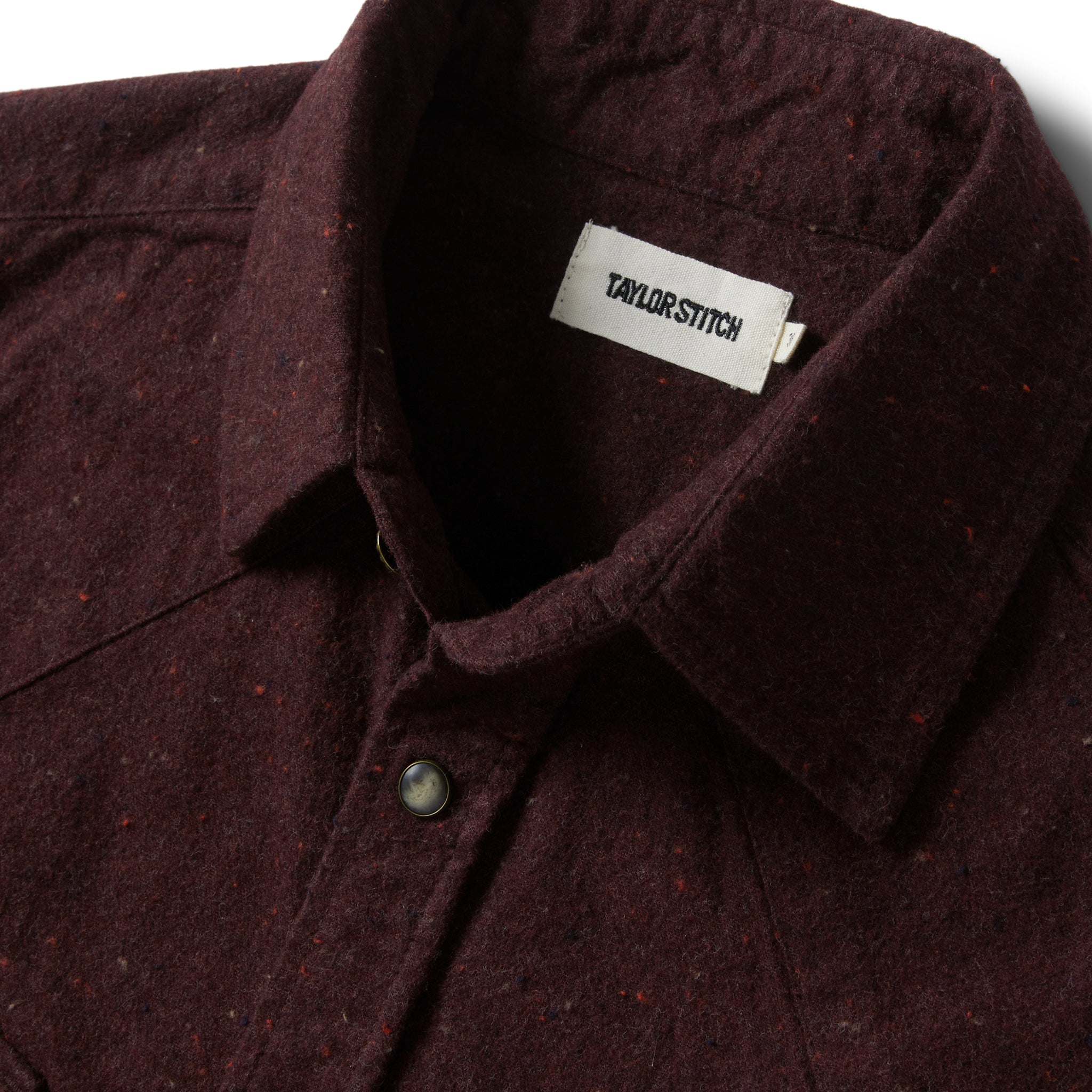 material shot of the collar on The Western Shirt in Nutmeg Donegal, Wovens by Taylor Stitch