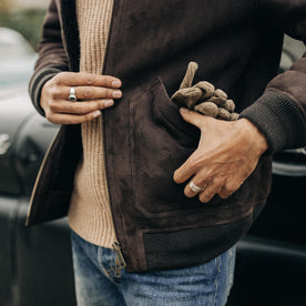 fit model with hands in the pocket of The Wright Jacket in Espresso Shearling