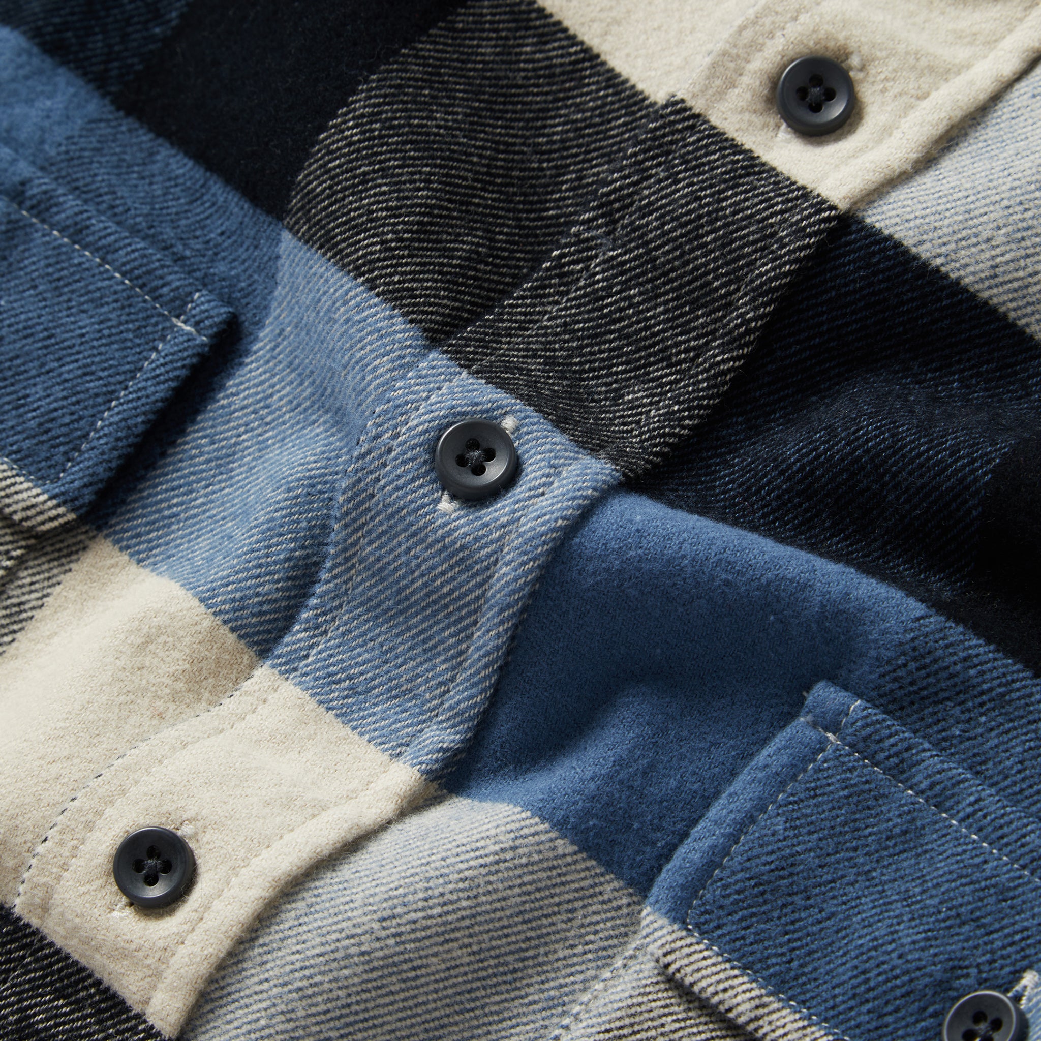material shot of the buttons on The Yosemite Shirt in Icicle Check, Wovens by Taylor Stitch
